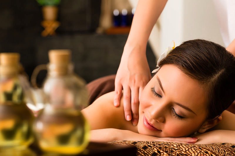 Beautiful asian massage therapist